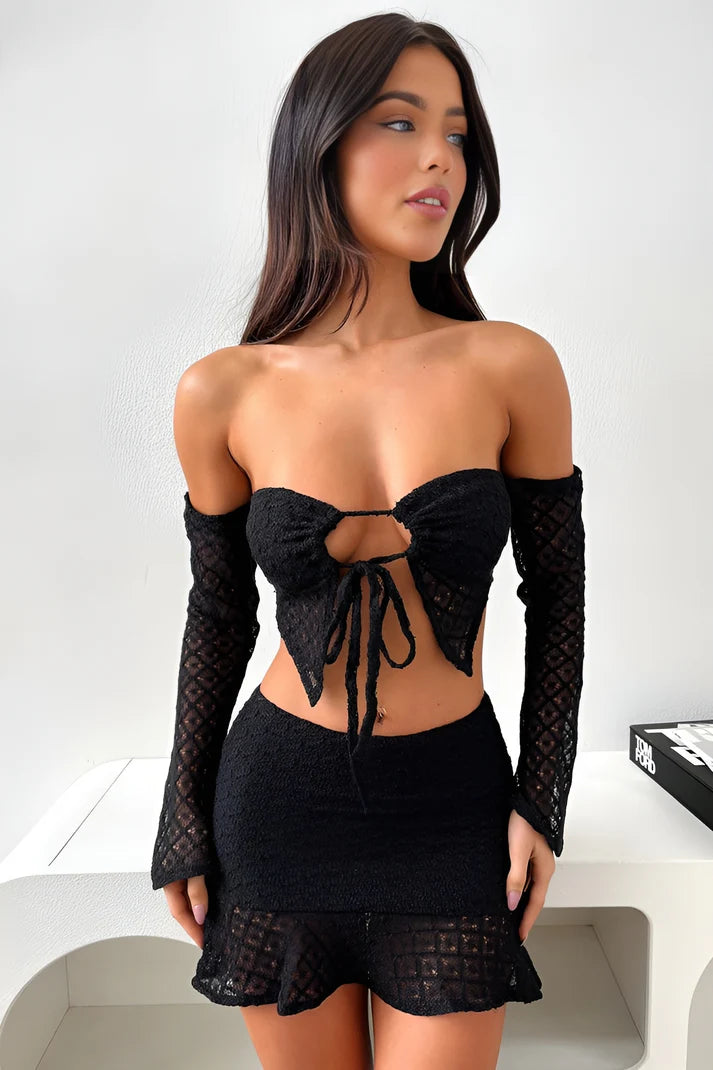 Model wearing Anya Set – fitted crop top and above-knee floral skirt two piece set by Santori The Label