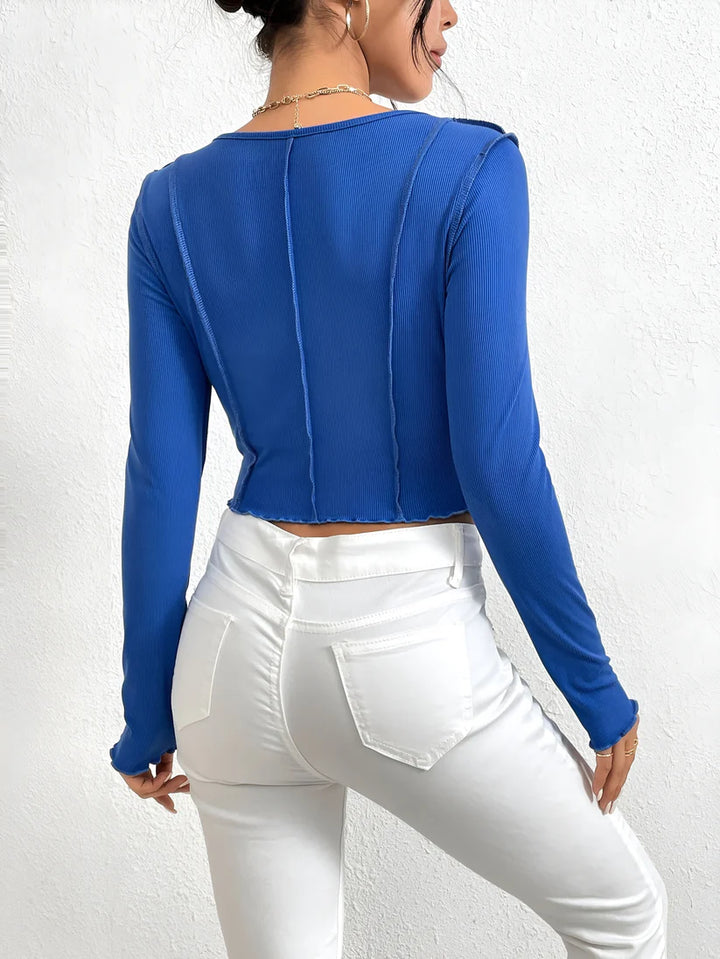 Model wearing Ameera Top – slim winter knit top with irregular stitching detail by Santori The Label.
