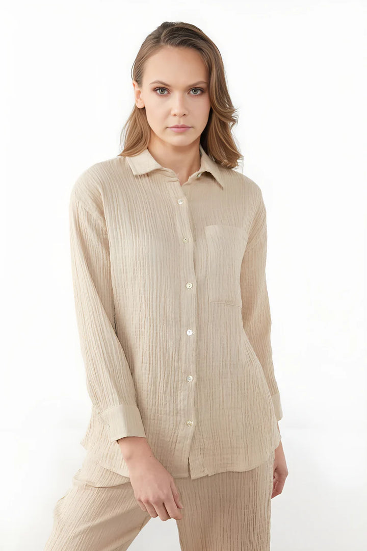 Model wearing Lilia Long Sleeve Top – relaxed cotton long sleeve top in soft natural fabric by Santori The Label.