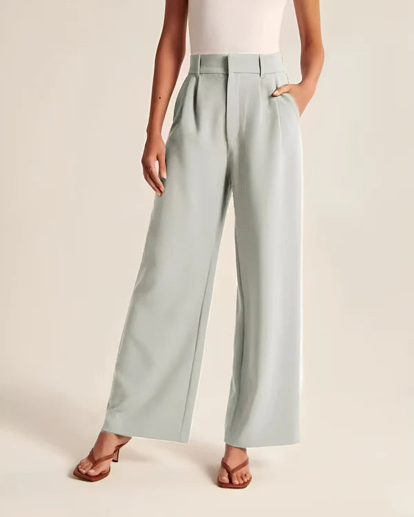 Model wearing Macmillan Pants – casual relaxed-fit trousers for women in minimal design, by Santori The Label