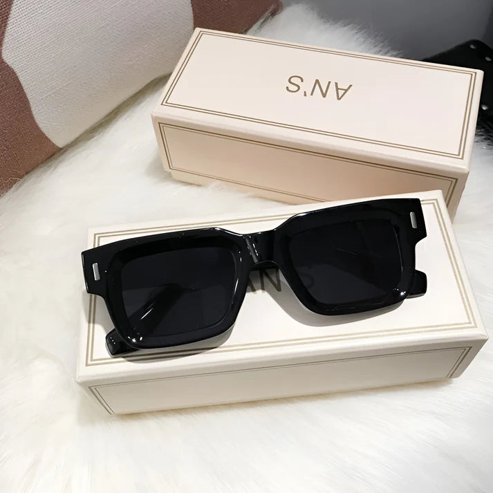 Model wearing Lexie Rectangular Sunglasses – bold cat-eye inspired UV400 fashion sunglasses with plastic frame and acrylic lenses by Santori The Label