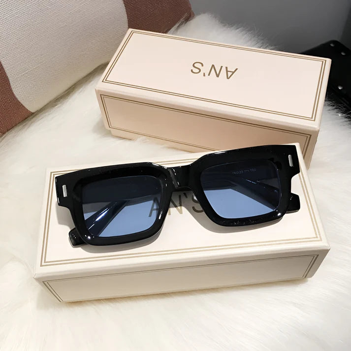 Model wearing Lexie Rectangular Sunglasses – bold cat-eye inspired UV400 fashion sunglasses with plastic frame and acrylic lenses by Santori The Label