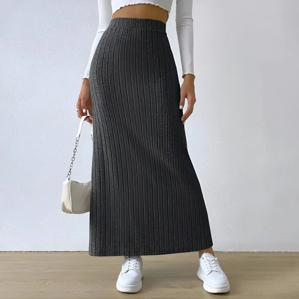 Model wearing Lewis Skirt – straight mid-calf solid skirt, styled for professional wear, by Santori The Label