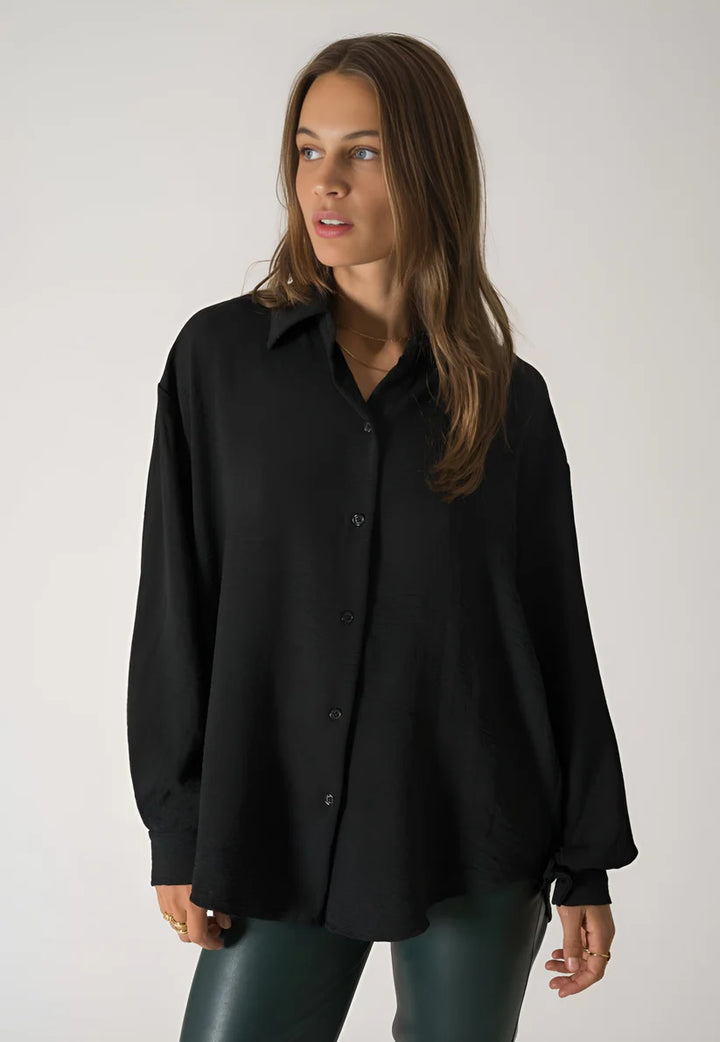 Model wearing Lilia Long Sleeve Top – relaxed cotton long sleeve top in soft natural fabric by Santori The Label.