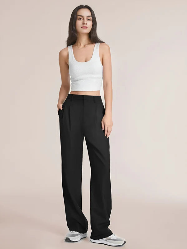 Model wearing Macmillan Pants – casual relaxed-fit trousers for women in minimal design, by Santori The Label
