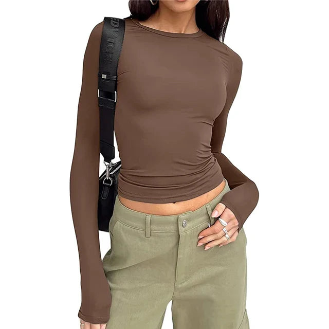 Model wearing Butter Long Sleeve Top – high stretch fitted long sleeve top in sleek, minimalist style by Santori The Label.