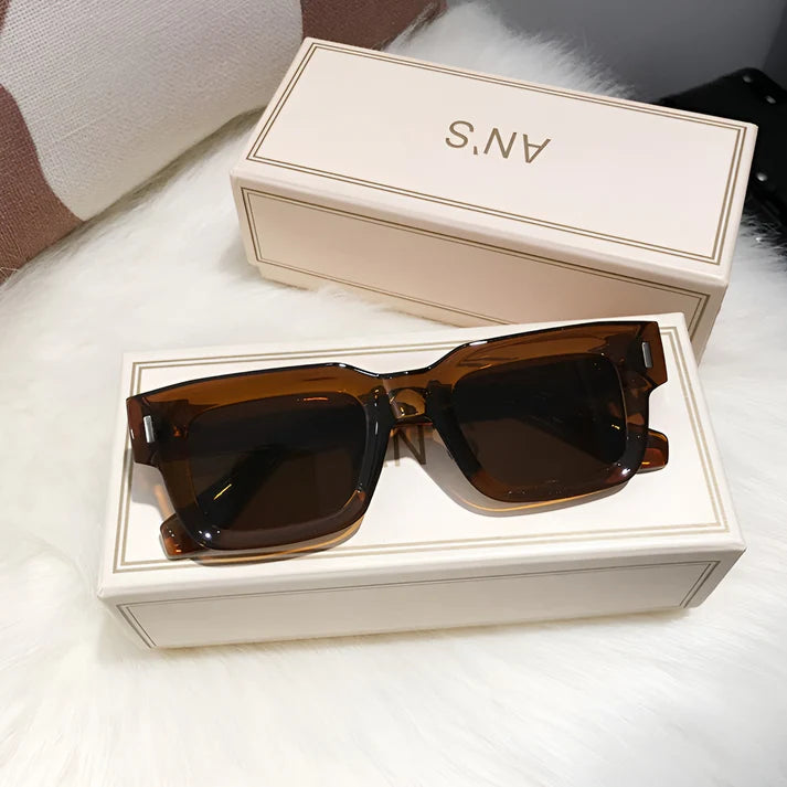Model wearing Lexie Rectangular Sunglasses – bold cat-eye inspired UV400 fashion sunglasses with plastic frame and acrylic lenses by Santori The Label