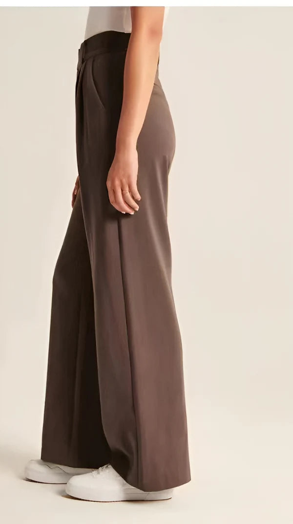 Model wearing Macmillan Pants – casual relaxed-fit trousers for women in minimal design, by Santori The Label