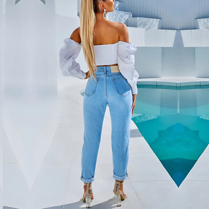Model wearing Emma Top – slim fit fashion top for women in cropped silhouette with minimalist style, by Santori The Label.