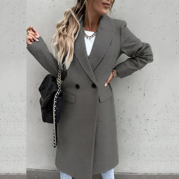 Model wearing Rocel Jacket – loose fit polyester women’s winter jacket in solid minimalist style by Santori The Label
