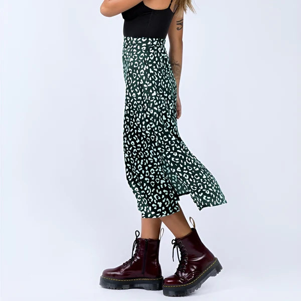 Model wearing Lydie Skirt – printed mid-calf A-line cotton skirt, styled for casual warm weather, by Santori The Label