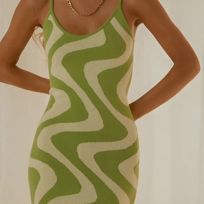 Model wearing Sarjah Maxi Dress – slim fit printed office-ready summer maxi by Santori The Label.