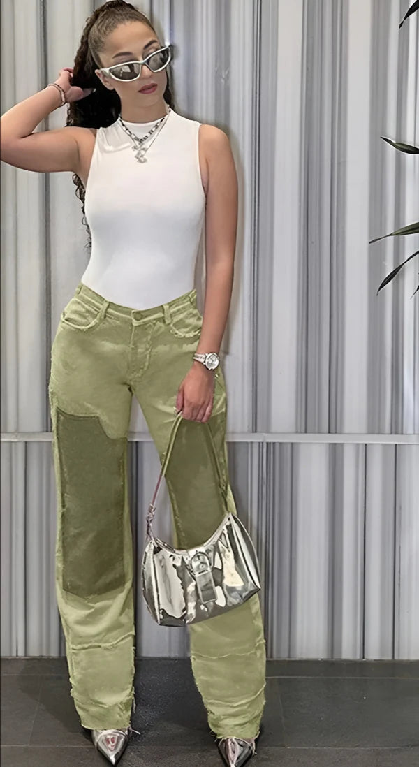 Model wearing Vien Pants – above-the-knee straight-leg mini trousers in solid polyester, by Santori The Label
