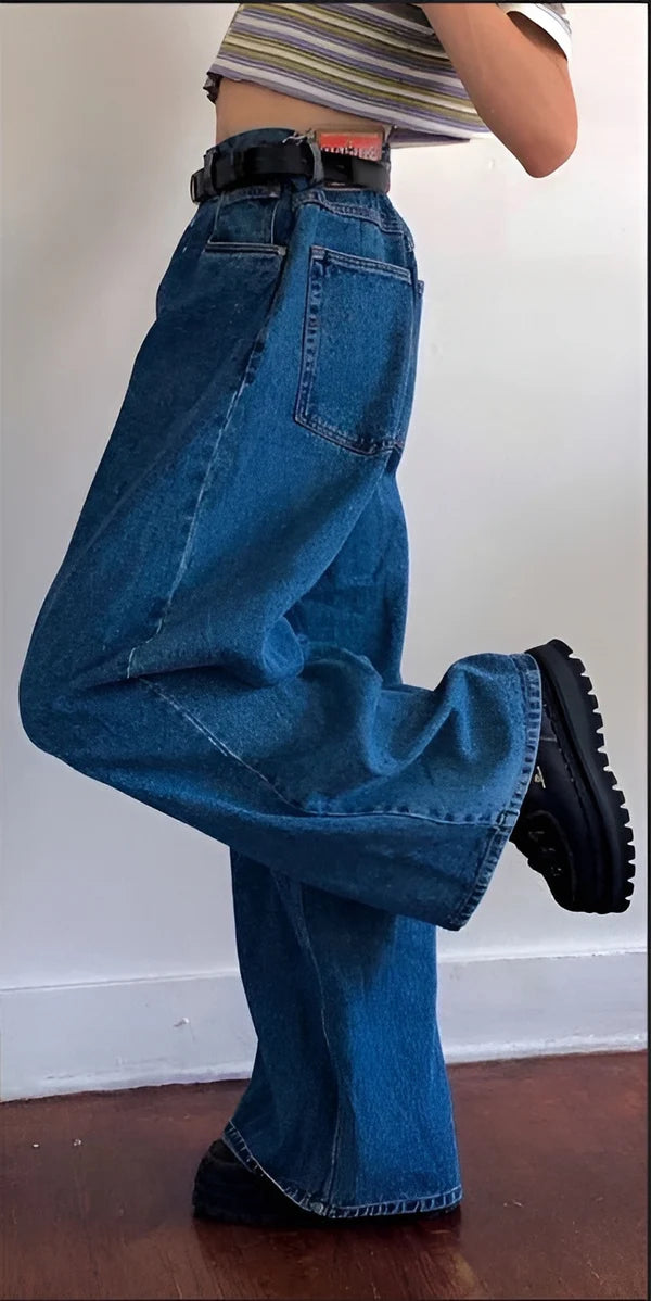Model wearing Jeaney Pants – high-waisted ankle-length flared trousers with retro silhouette and spliced contrast detail by Santori The Label