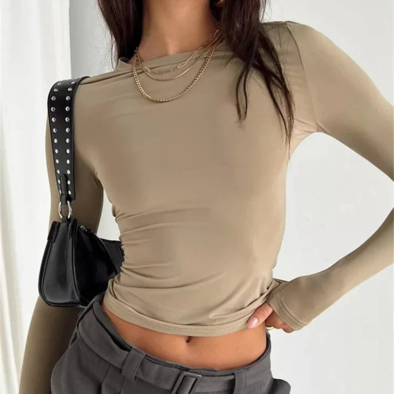 Model wearing Butter Long Sleeve Top – high stretch fitted long sleeve top in sleek, minimalist style by Santori The Label.