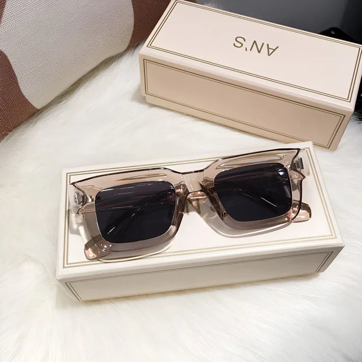 Model wearing Lexie Rectangular Sunglasses – bold cat-eye inspired UV400 fashion sunglasses with plastic frame and acrylic lenses by Santori The Label
