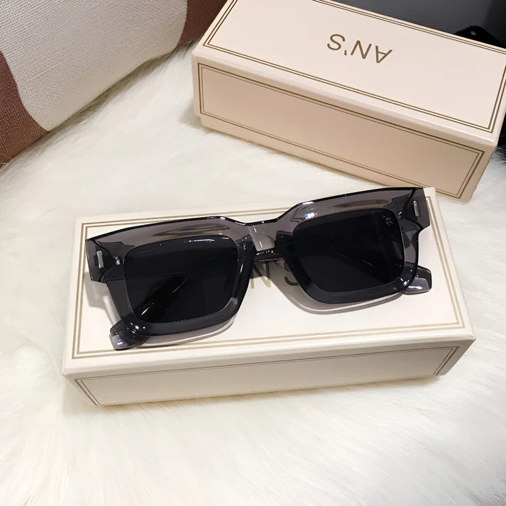 Model wearing Lexie Rectangular Sunglasses – bold cat-eye inspired UV400 fashion sunglasses with plastic frame and acrylic lenses by Santori The Label