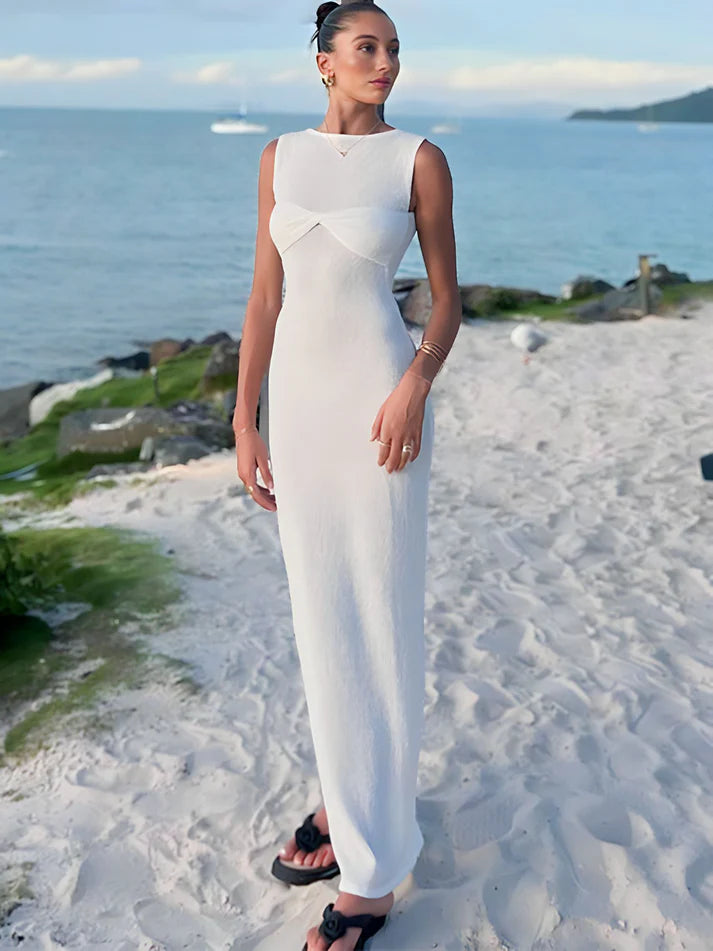 Model wearing Niana Maxi Dress – summer beach-style maxi dress with straight silhouette by Santori The Label.