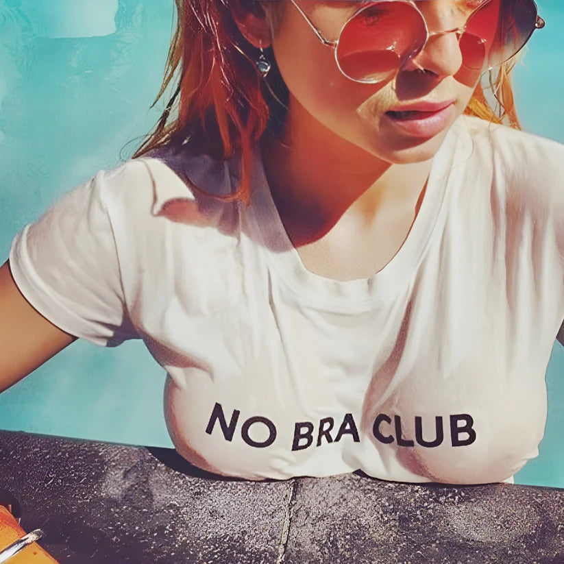 Model wearing No Bra Club Top – bold slogan crop top for women in casual summer styling by Santori The Label.