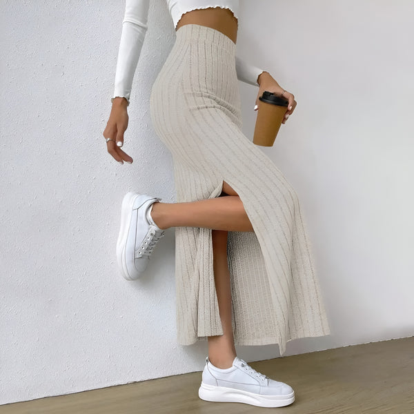 Model wearing Lewis Skirt – straight mid-calf solid skirt, styled for professional wear, by Santori The Label