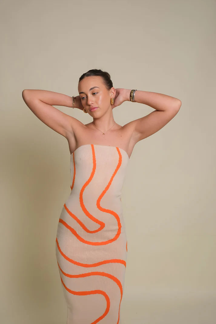 Model wearing Kerry Midi Dress – striped cotton knit bodycon midi with all-season versatility by Santori The Label.