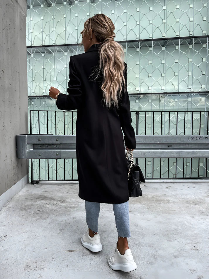 Model wearing Rocel Jacket – loose fit polyester women’s winter jacket in solid minimalist style by Santori The Label