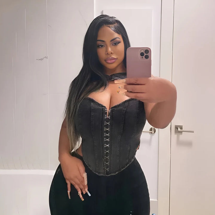 Model wearing Miranda Top – sexy black cropped denim top with a fitted silhouette and clubwear edge by Santori The Label.