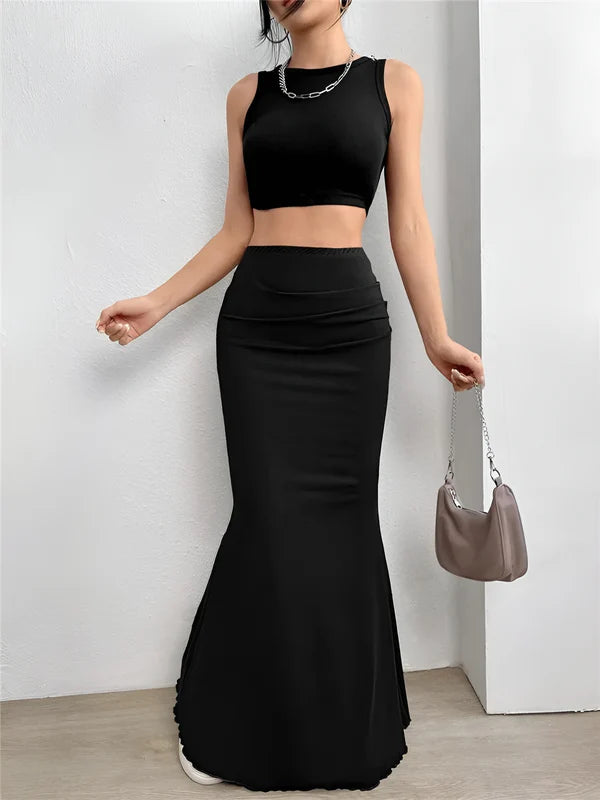 Model wearing Candyce Skirt – floor-length solid mermaid silhouette styled for formal occasions, by Santori The Label