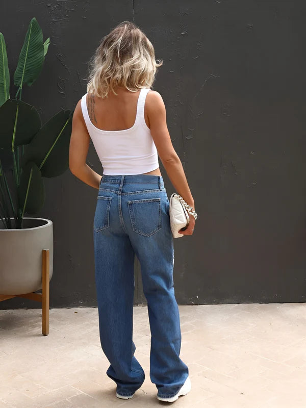 Model wearing Matilda Pants – full-length straight-leg trousers with vintage English style in a mid-rise cut by Santori The Label