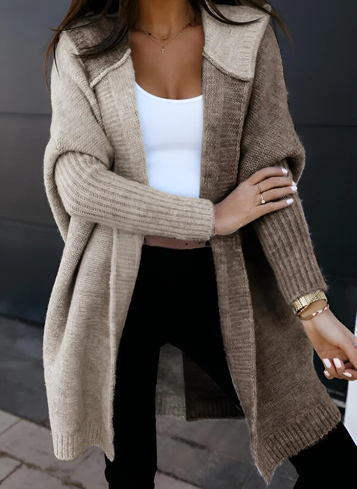 Model wearing Mimi Sweater – long loose-fit women’s patchwork knit sweater for winter, by Santori The Label