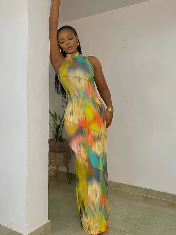 Model wearing Poppy Maxi Dress – bold summer patchwork maxi dress with stretch fit by Santori The Label.