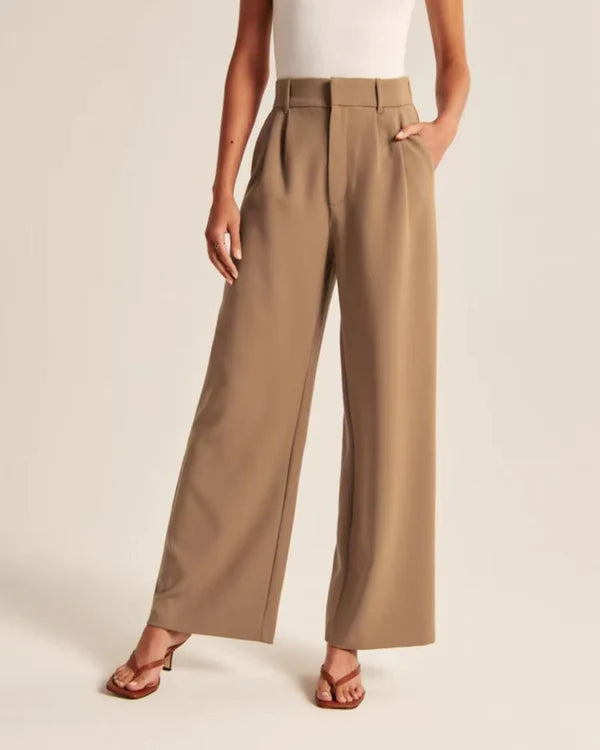 Model wearing Macmillan Pants – casual relaxed-fit trousers for women in minimal design, by Santori The Label