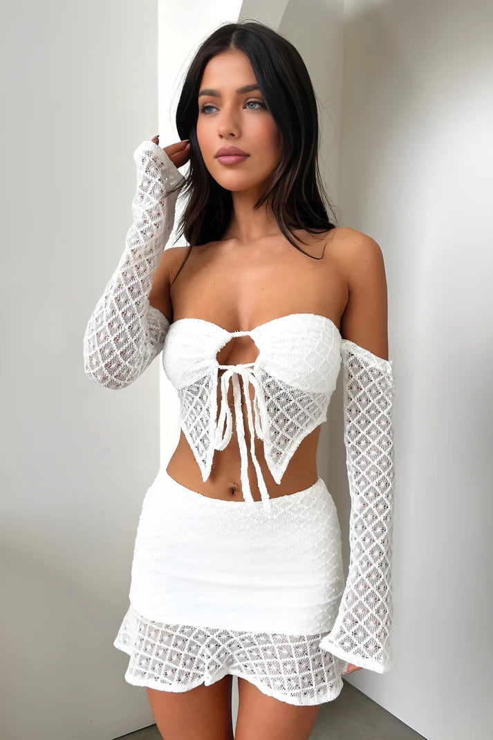 Model wearing Anya Set – fitted crop top and above-knee floral skirt two piece set by Santori The Label