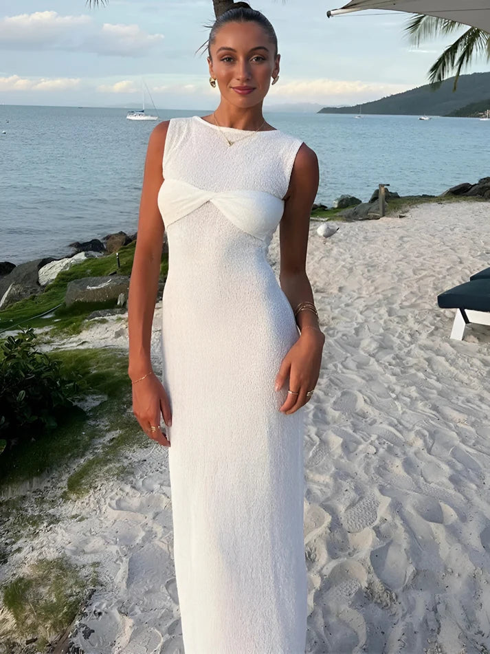 Model wearing Niana Maxi Dress – summer beach-style maxi dress with straight silhouette by Santori The Label.