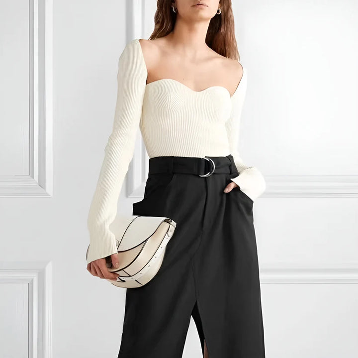Model wearing Nikki Top – long sleeve cropped streetwear knit top by Santori The Label.