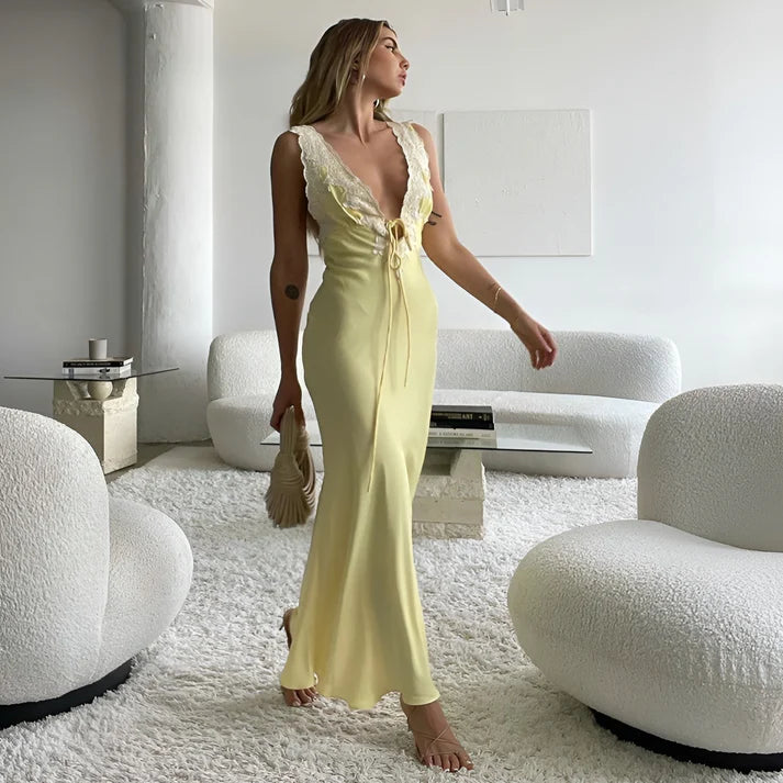 Model wearing Romanna Maxi Dress – slim fit printed summer beach maxi with lace accents by Santori The Label.